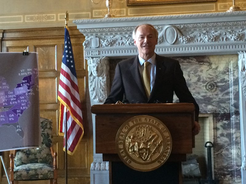 Gov. Asa Hutchinson speaks at a news conference Tuesday. 