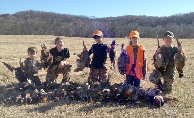Photo by Tim Craig Members of the Big Spring Sporting Club are introducing their children to the sport of hunting at an early age. Following the advice on a bumper sticker spotted in the area, &#8220;Hunt With Your Kids, Not For Them,&#8221; they took these youngsters along on a recent pheasant hunt at Bird Springs Resort. Pictured are Will Rateliff (left), Olivia Roberts, Rhett Weisner, Ryleigh Craig and Chase Cooper.