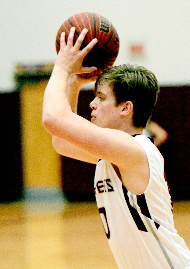 Bud Sullins/Special to the Herald-Leader Siloam Springs senior guard Tucker Gambill looks for a pass in a recent Panthers basketball game. The Panthers played at Van Buren on Tuesday. Results were not available at presstime. Siloam Springs hosts Conway on Friday at Panther Activity Center for a 7A/6A-Central Conference basketball game.