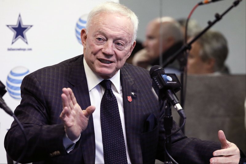 Dallas Cowboys team owner Jerry Jones responds to questions during a news conference at the teams headquarters, Thursday, Jan. 15, 2015, in Irving, Texas. Scott Linehan is returning to the Dallas Cowboys along with coach Jason Garrett and will add the title of offensive coordinator after one season as Tony Romo's play-caller. (AP Photo/Tony Gutierrez)