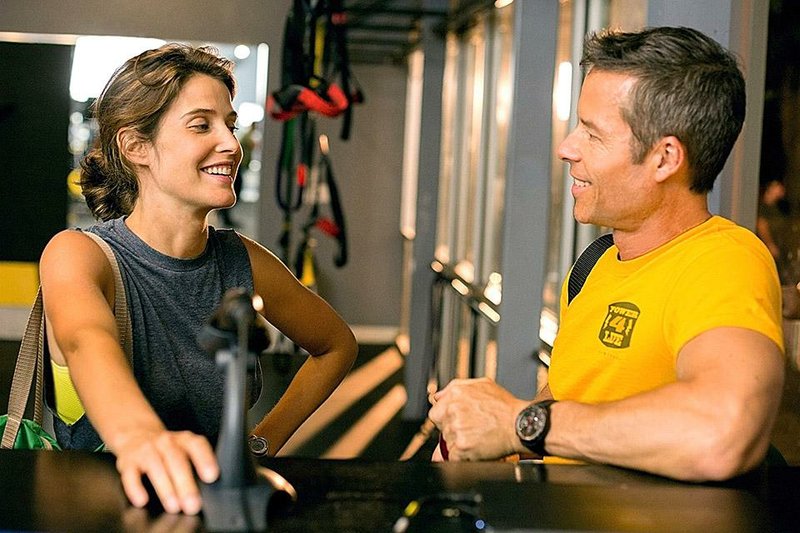 Guy Pearce and Cobie Smulders in Results. 