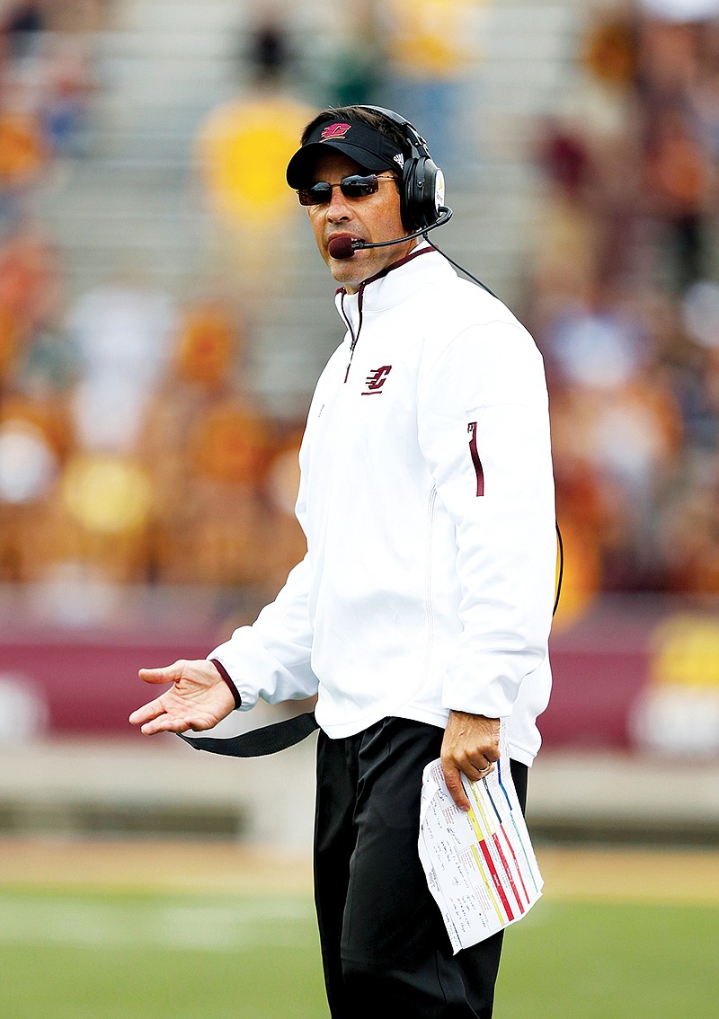The Associated Press PLAY CALLER: Dan Enos, pictured on the Central Michigan sideline last year in a game against Michigan State, steps down as head coach at the school to become offensive coordinator and quarterbacks coach at Arkansas under Bret Bielema.