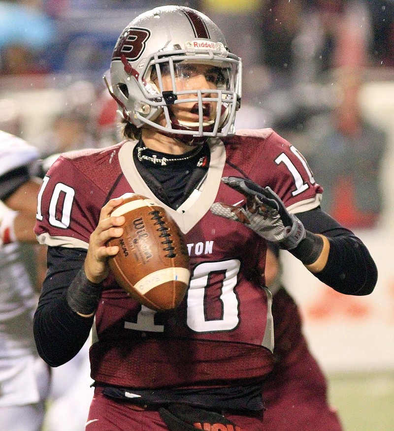 Benton quarterback Cason Maertens rolls out to pass during the Class 6A state championship game. Maertens is the Tri-Lakes Edition Offensive Player of the Year. 