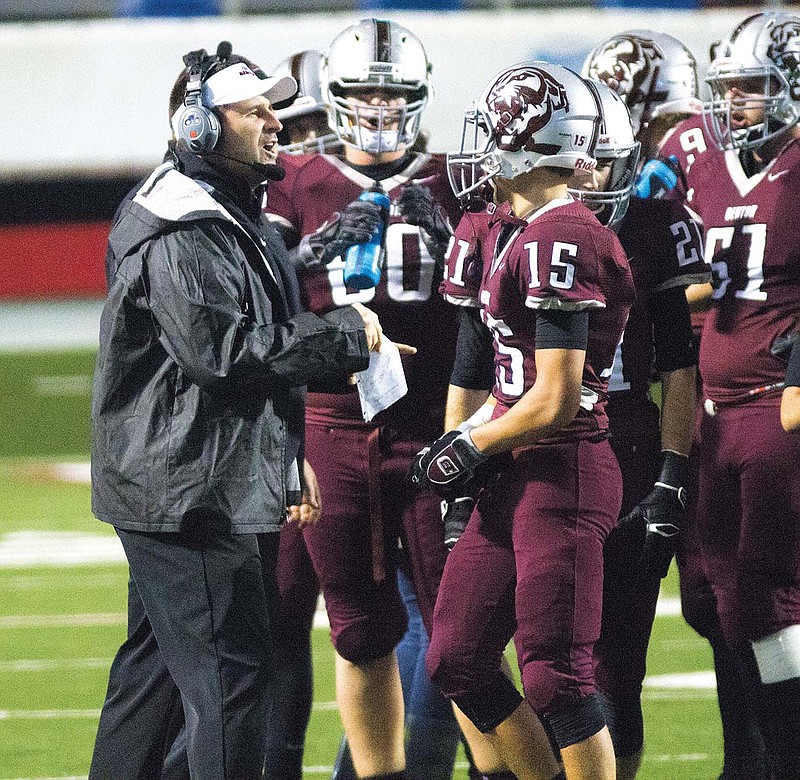 Benton coach Scott Neathery talks to his team during the Class 6A state championship game at War Memorial Stadium in Little Rock. Neathery is the 2014 Tri-Lakes Edition Coach of the Year.