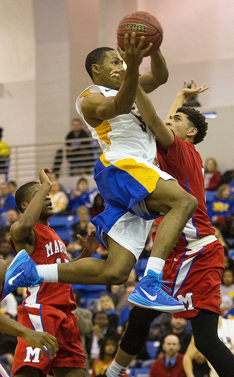 Arkansas Democrat-Gazette/MELISSA SUE GERRITS - 01/23/2015 - NLR's Kevaughn Allen leaps for a 2 pointer while Marion's Will Mangum tries to block during their game at NLR January 23, 2015. 