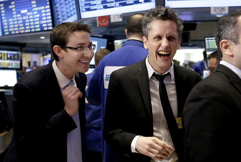 Box, Inc. Chairman, CEO & co-founder Aaron Levie right, and company CFO and co-founder Dylan Smith, prepare to ring the New York Stock Exchange opening bell, marking their company's IPO on the floor of the New York Stock Exchange, Friday, Jan. 23, 2015. Box Inc. shares soared 56 percent in their stock market debut, after the online storage provider raised $175 million in its initial public offering. (AP Photo/Richard Drew)