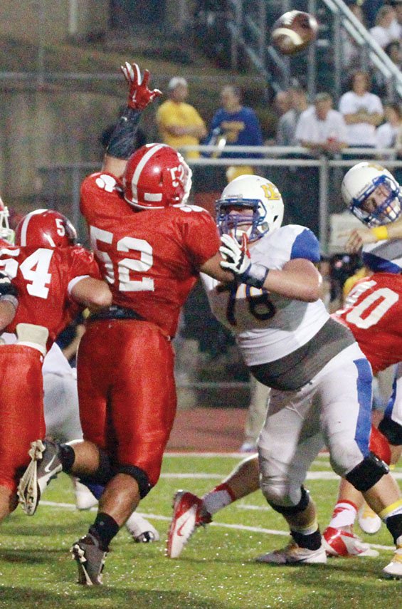 Cabot’s Tristan Bulice, No. 52, tries to block a pass against North Little Rock. Bulice is the Three Rivers Edition Defensive Player of the Year.