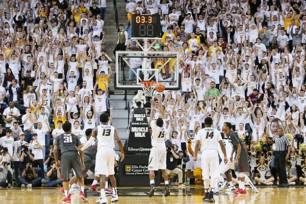 Missouri guard Wes Clark misses his second free throw attempt to tie the game in the final seconds of an NCAA college basketball game against Arkansas, Saturday, Jan. 24, 2015, in Columbia, Mo. Arkansas won 61-60. (AP Photo/St. Louis Post-Dispatch, Chris Lee)