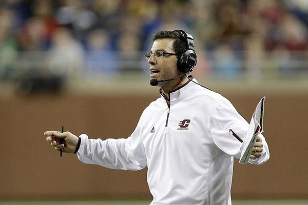 Central Michigan head coach Dan Enos gestures to a referee during the fourth quarter of the Little Caesars Pizza Bowl NCAA college football game against Western Kentucky at Ford Field in Detroit, Wednesday, Dec. 26, 2012. (AP Photo/Carlos Osorio)