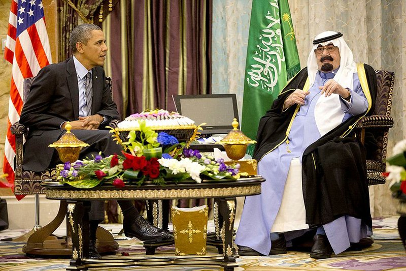 FILE - In this March 28, 2014 file photo, President Barack Obama meets with Saudi King Abdullah at Rawdat Khuraim, Saudi Arabia. President Barack Obama will cut short his three-day trip to India to travel to Saudi Arabia to pay respects following the death of King Abdullah, U.S. and Indian officials said Saturday, hours before the U.S. president was to depart for New Delhi. The schedule change means Obama will skip plans to visit the Taj Mahal, the white marble monument of love. Pradeep Bhatnagar, a top state official based in the city of Agra, where the Taj Mahal is located, said U.S. security officials informed him of the cancellation Saturday. (AP Photo/Pablo Martinez Monsivais, File)