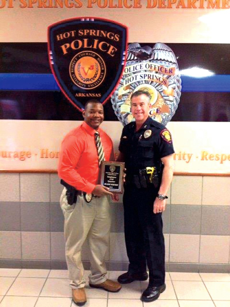 Submitted photo Det. B. Haynie received the &#8220;Employee of the Quarter&#8221; award from Chief Flory after showing exemplary service at the Hot Springs Police Department. The award was suggested by Capt C. Chapmond to honor employees of the department who show exemplary service. Haynie was nominated for his &#8220;great work in the arrest of a sexual assault suspect at the mall on Sept. 12, 2014.&#8221; He is the first employee to receive the award.