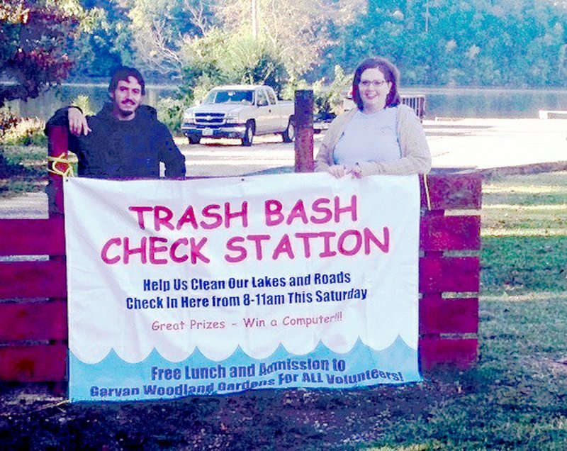 Submitted photo City Plumbing, Heating &amp; Electric employees voted to give the Trash Bash Council their December 2014 &#8220;Giving Back to the Community&#8221; donation. This gift will bring the company&#8217;s total &#8220;Giving Back&#8221; amount to more than $73,820. Two employees, John Bright, left, and Leslie Henderson, volunteered their time at the most recent Trash Bash event. Trash Bash is an opportunity for residents of Garland and Hot Spring counties to come together and clean up Lake Hamilton, Lake Catherine and Ouachita River. According to Keep Arkansas Beautiful, Trash Bash is the largest organized shoreline clean-up event in the state. The event is essential to the water quality of the lakes and river. &#8220;For the best solution for all your service needs, give City Plumbing, Heating &amp; Electric a call. Help us, help each other, and help yourselves.&#8221;