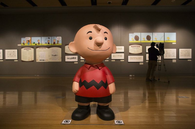 Arkansas Democrat-Gazette/MELISSA SUE GERRITS - 01/16/2015 - Items from the Charles M. Schultz museum in Santa Rosa, California, form the exhibits "Pigskin in Peanuts" and "Heartbreak in Peanuts" at the Clinton Presidential Center January 16, 2015. The exhibit will be open till April 5, 2015. 
