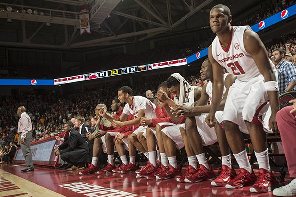 The Arkansas bench celebrates a made free throw against Tennessee late in the second half to put the game out of reach for the Volunteers Tuesday, Jan. 27, 2015 in Bud Walton Arena in Fayetteville. The Razorbacks won 69-64.