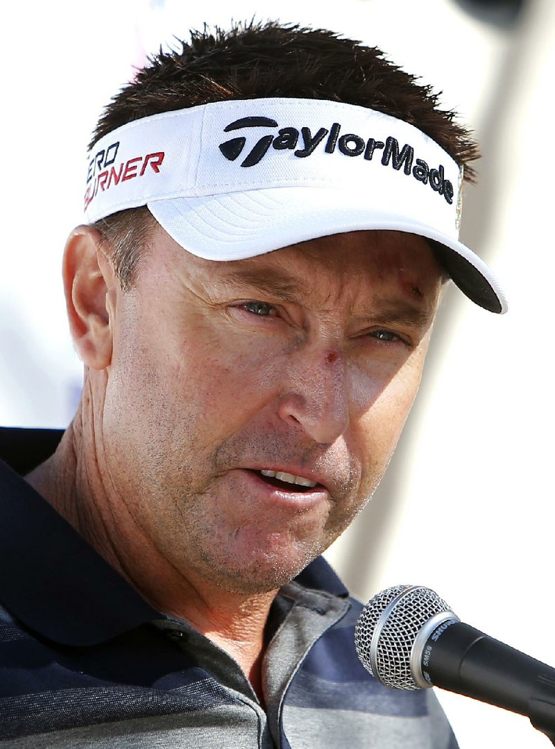 A defiant and at times angry Robert Allenby stood by his story Tuesday that he was robbed and beaten in Honolulu.