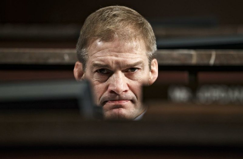 House Select Committee on Benghazi member Rep. Jim Jordan, R-Ohio, listens to questioning Tuesday on Capitol Hill in Washington as the committee held its third public hearing to investigate the 2012 attacks on the U.S. Consulate in Benghazi, Libya, where four Americans were killed. 