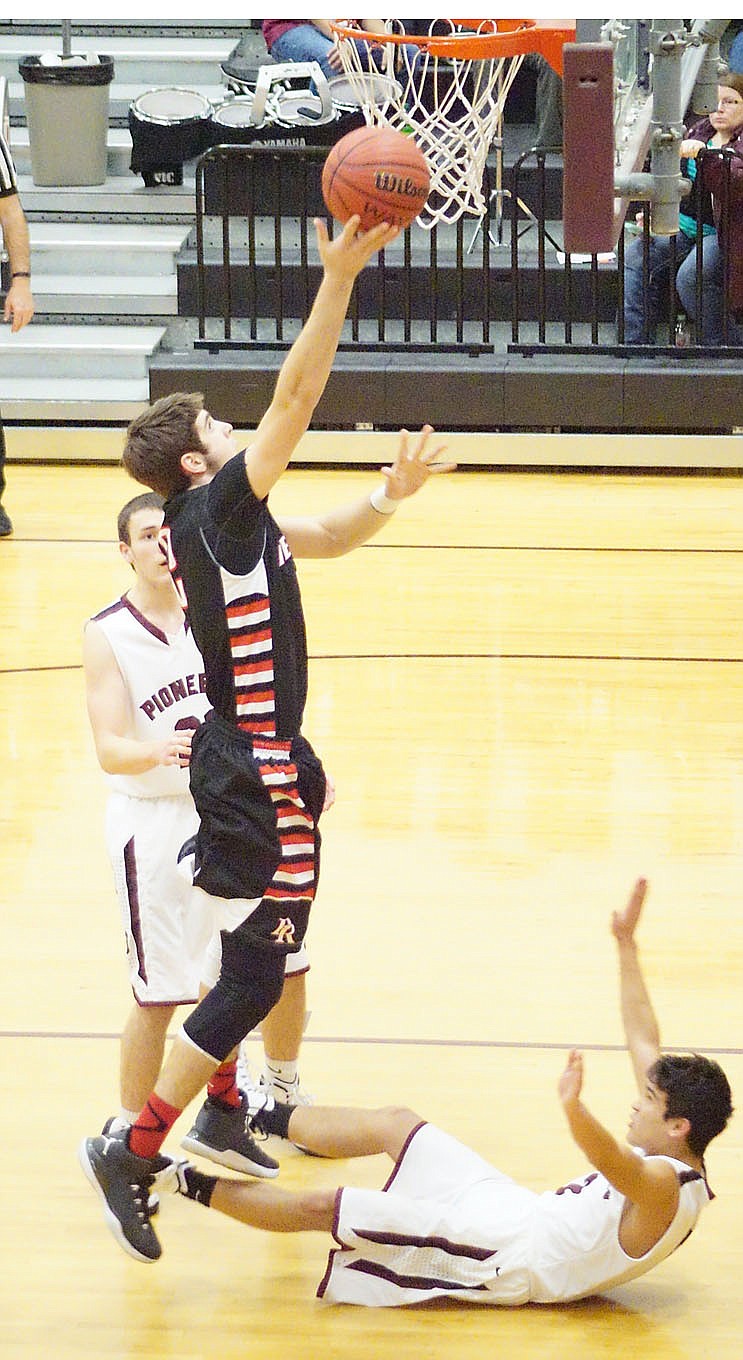 Staff photographs by Randy Moll, Westside Eagle Observer Blackhawk senior Tristan Trundle goes in for a lay-up Friday in the Gentry gym.