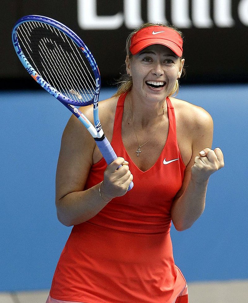 Maria Sharapova celebrates after beating Ekaterina Makarova in a semifi nal match at the Australian Open in Melbourne. Sharapova will face Serena Williams, who beat Madison Keys in the other semifinal, in the final. 