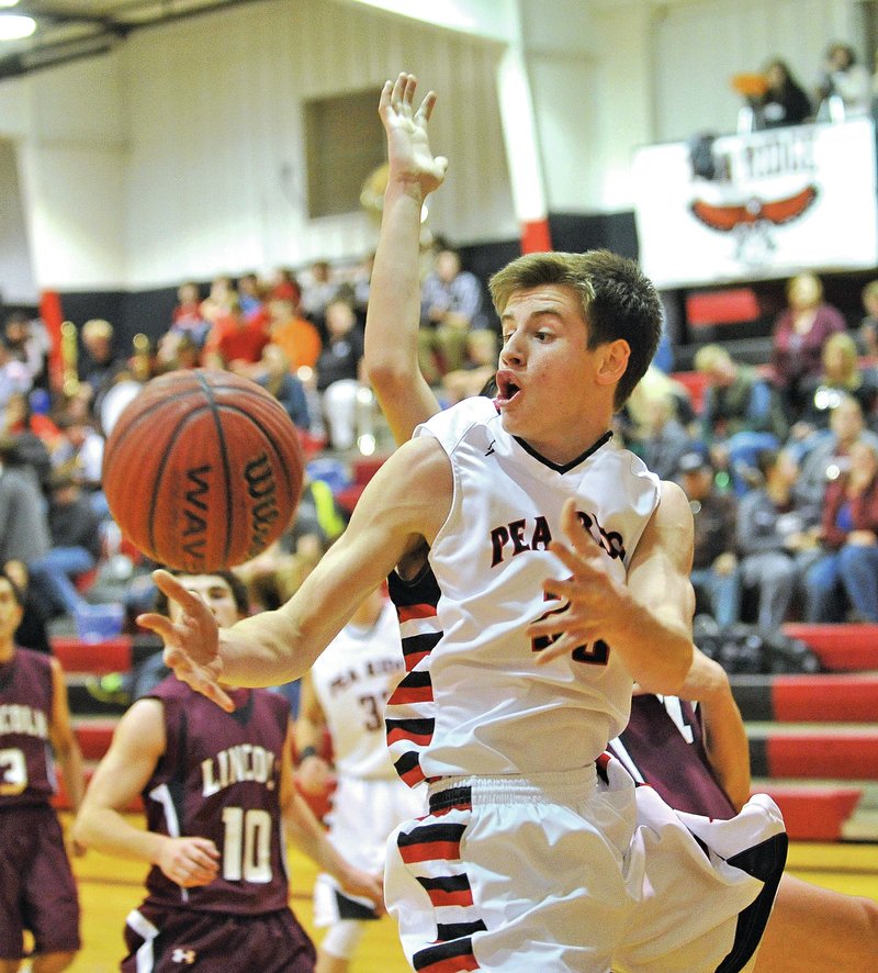 NWA Democrat-Gazette/MICHAEL WOODS &#8226; @NWAMICHAELW Blake Shepherd of Pea Ridge tries to drive to the hoop Tuesday against Lincoln in Pea Ridge. The Blackhawks edged Lincoln 50-43 to maintain their hold on first place in the 4A-1 Conference standings.