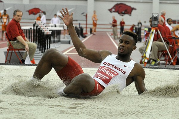 Arkansas' Jarrion Lawson jumps during a meet against Texas on Friday, Jan. 16, 2015 at Randal Tyson Track Center in Fayetteville. 