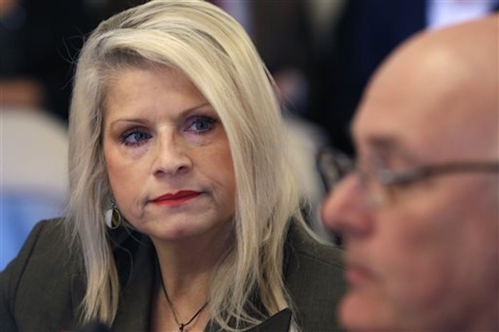 FILE — Sen. Linda Collins-Smith, R-Pocahontas, listens to testimony at a meeting of the Senate Committee on Public Health, Welfare, and Labor at the state Capitol in Little Rock on Wednesday, Jan. 28, 2015. 