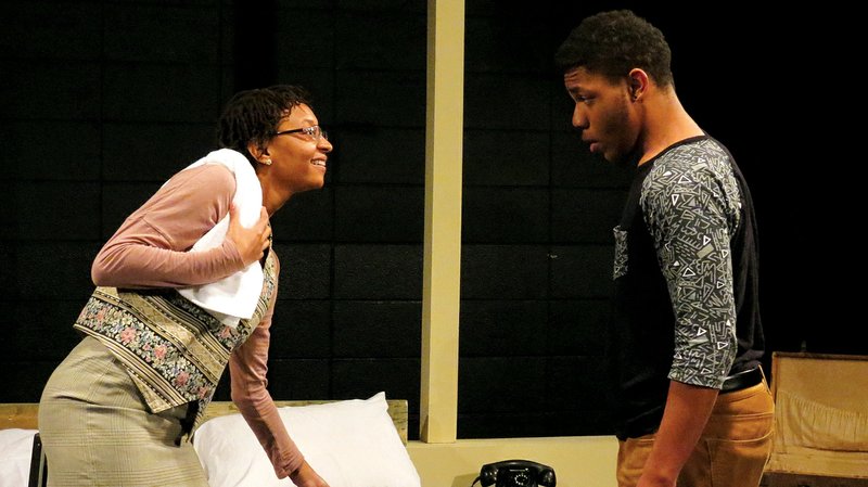 Britney Walker-Merritte and Trey Smith rehearse for “The Mountaintop,” a production of the University of Arkansas theater department and the African and African American Studies Program. The two-person play imagines what might have happened the night before Dr. Martin Luther King Jr. was assassinated at the Lorraine Motel in Memphis, Tenn. 