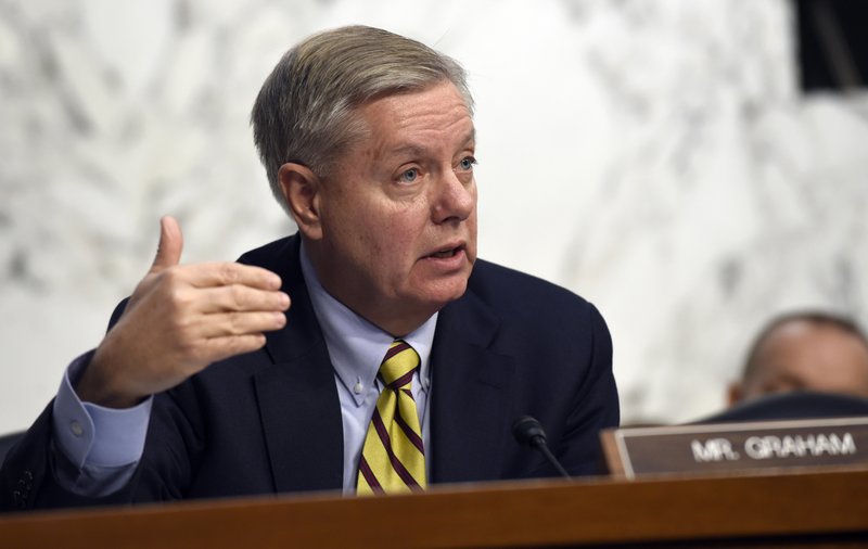 In this Jan. 28, 2015, photo, Sen. Lindsey Graham, R-S.C., on Capitol Hill in Washington. U.S. officials say an independent commission is recommending broad changes to the militarys retirement and health care systems that could save more than $20 billion over the next four years.  Graham told military leaders during a hearing that "we need to look at reforming pay and benefits, be generous but sustainable."