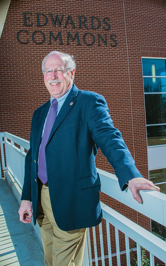 Bruce Johnston, vice president for student life and dean of students at Lyon College in Batesville, stands outside the building where his office is located, as well as the cafeteria and other student facilities, which are what Johnston has concerned himself with for the past 25 years.
