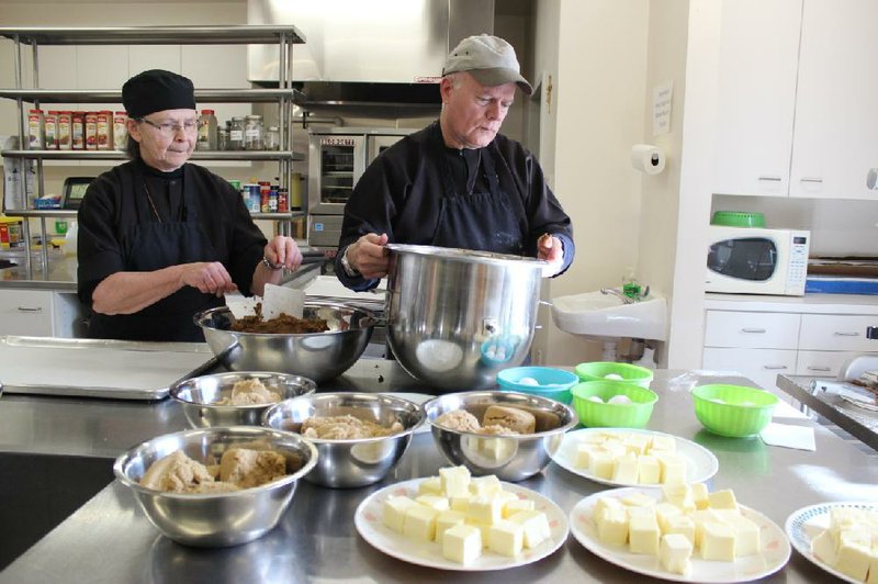 Carolyn and Mark Shepler, members of the Brothers and Sisters of Charity in Berryville, are part of the team that makes baked goods for the Little Portion Bakery. 