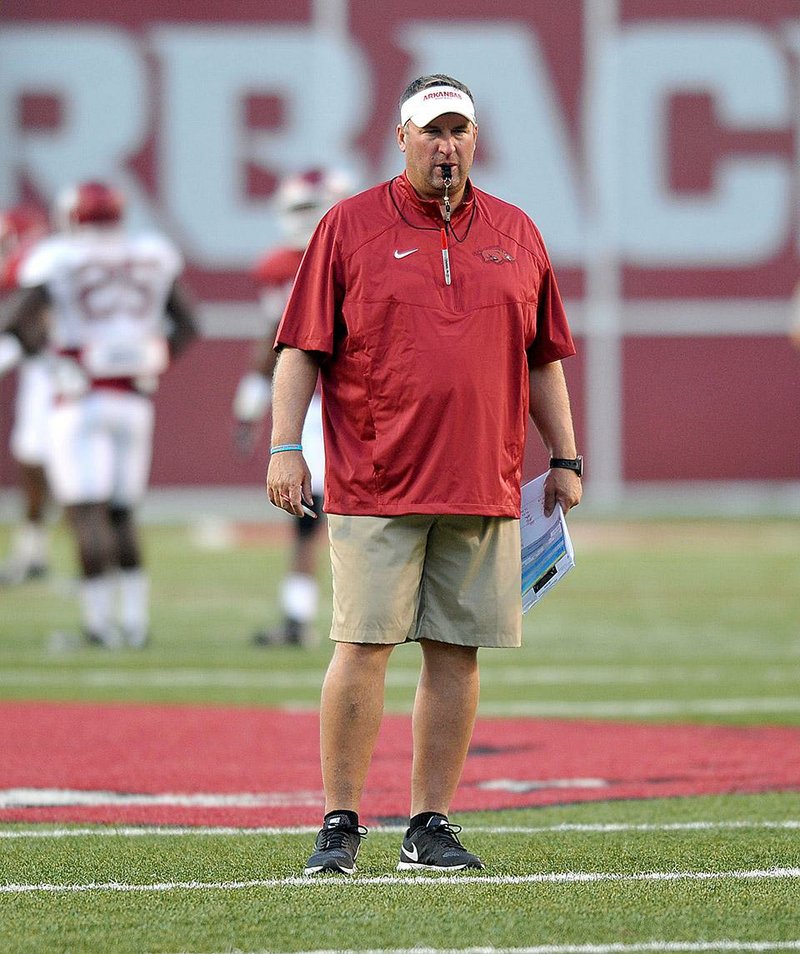 While at Wisconsin, Arkansas Coach Bret Bielema saw a potential star in Russell Wilson.