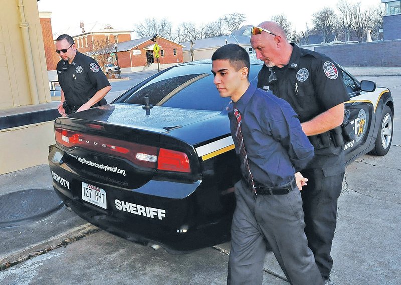Benton County Sheriff’s Office deputies bring Ali Matar to court Friday in Bentonville.