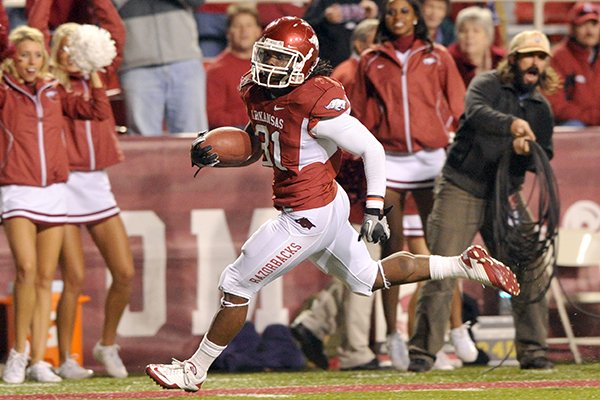 Arkansas safety Jerico Nelson returns an interception for a touchdown during the fourth quarter of a game against Vanderbilt on Saturday, Oct. 30, 2010 at Razorback Stadium in Fayetteville. 