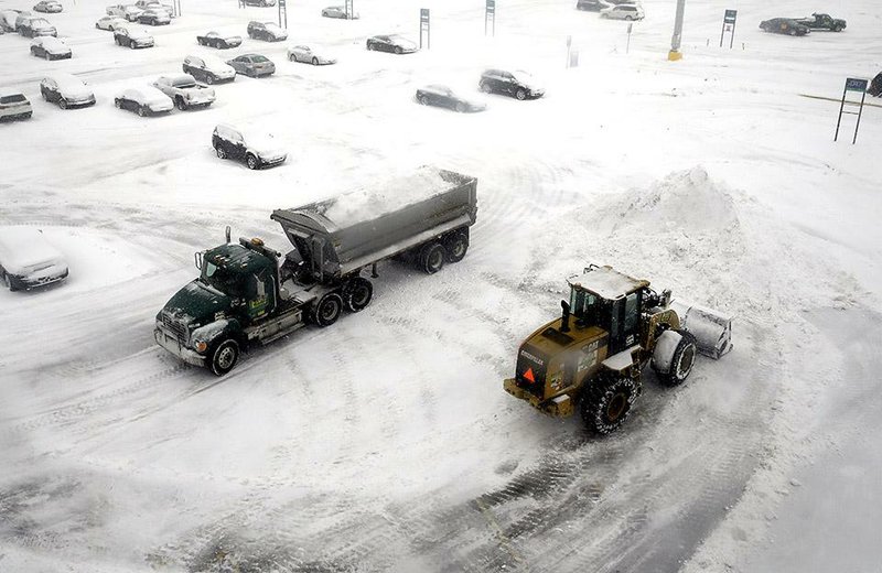 Snow snarls Chicago flights | The Arkansas Democrat-Gazette