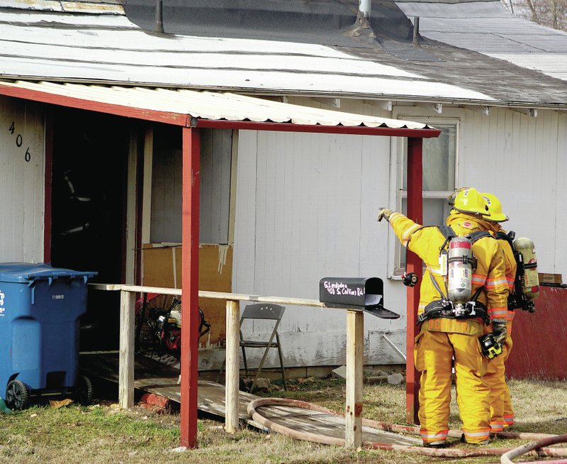 Gentry firefighters responded to a house fire at 406 S. Collins Ave. on Thursday shortly after 3 p.m. The fire reportedly started in the kitchen while the home&#8217;s resident was cooking. No injuries were reported in connection with the fire. Photo by Randy Moll