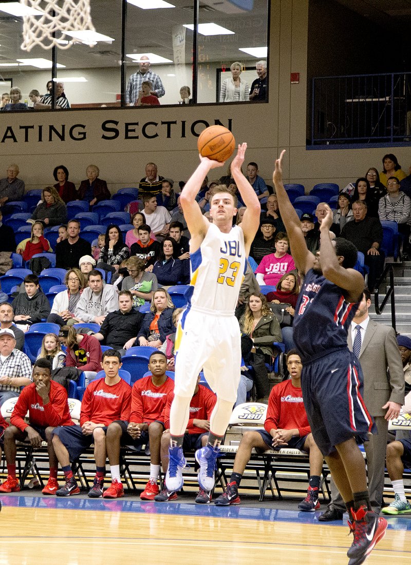 Kelsey Young/JBU Sports Information John Brown University junior D.J. Feitl knocked down 5 of 6 from behind the 3-point line in John Brown&#8217;s 90-68 win against St. Gregory&#8217;s on Saturday at Bill George Arena. The Golden Eagles, as a team, hit 15 of 23 from 3-point range.