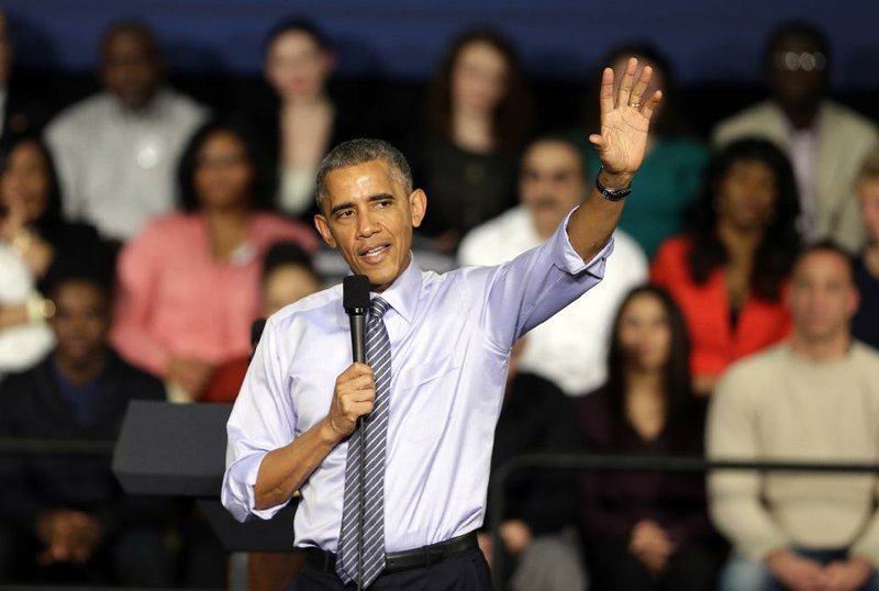 President Barack Obama takes questions after he spoke at Ivy Tech Community College in Indianapolis, Friday, Feb. 6, 2015. Obama was in Indianapolis to promote his budget proposal to make two years of community college free. (AP Photo/Michael Conroy)