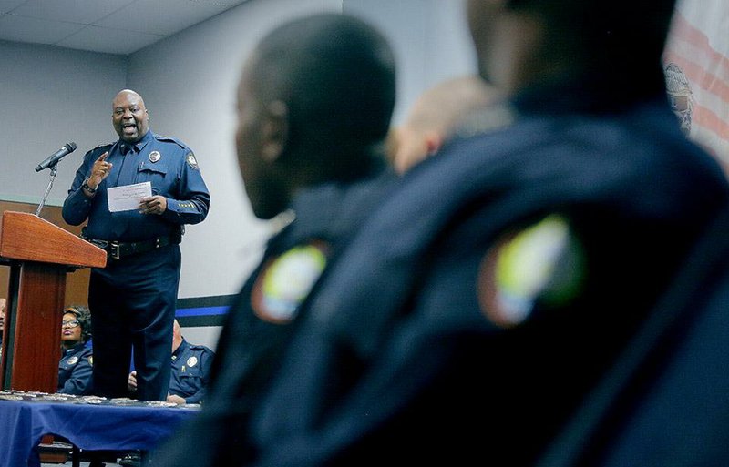 2/6/15
Arkansas Democrat-Gazette/STEPHEN B. THORNTON
Little Rock Police Chief Kenton Buckner directly addresses his new class of recruits during their graduation ceremony Friday in Little Rock.