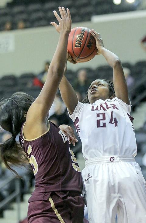 2/7/15
Arkansas Democrat-Gazette/STEPHEN B. THORNTON
UALR's Taylor Gault puts up a shot against Texas State's Erin Peoples during their game Saturday in Little Rock.