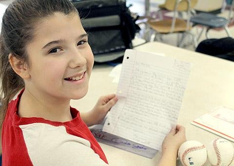 ADVANCE FOR WEEKEND EDITIONS, FEB. 7-8 - In this photo taken Jan. 23, 2015, Abby Campbell, 13, who has enjoyed learning about baseball hit king Pete Rose for a school project with Ashland Middle School teacher Larry Bailey, poses for a photo in Ashland, Ky. She holds a letter sent to her by Pete Rose. (AP Photo/The Daily Independent, Mark Maynard)