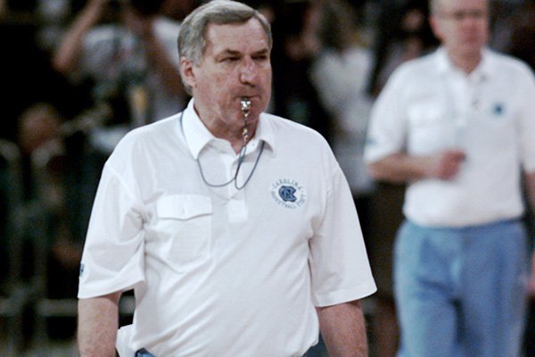 North Carolina head coach Dean Smith watches his team practice Friday March 31, 1995 at the Kingdome in Seattle.