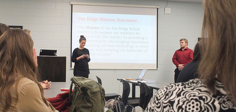 TIMES photograph by Annette Beard Juniors Lorrie Klein (not shown), Alleri Brown and Cody Foltz from Pea Ridge High School made a presentation to Pea Ridge School Board members during the January School Board meeting requesting that juniors be allowed an excused absence for a college visit. Board members approved their request which was recommended by superintendent Rick Neal. The students were commended for their thorough research and presentation.