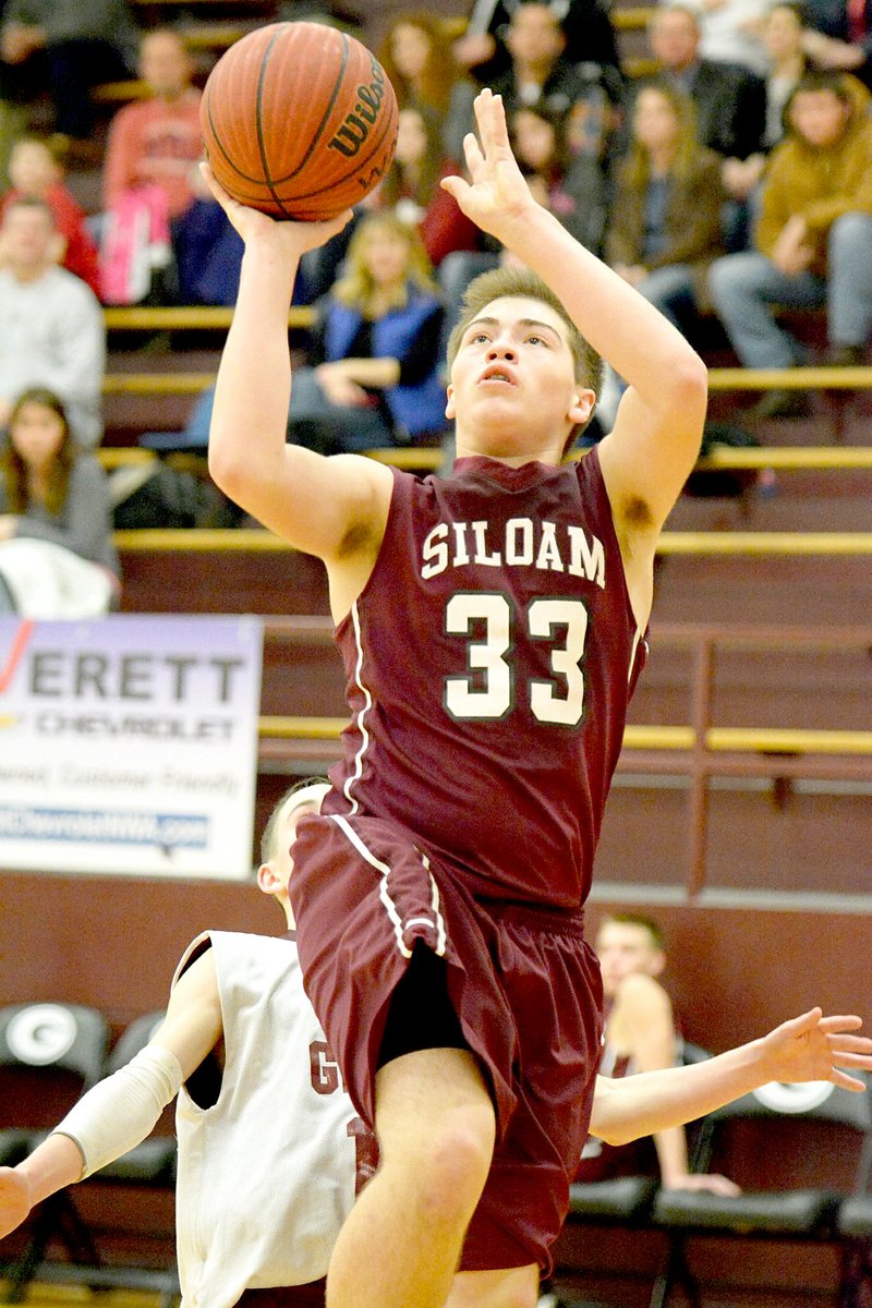 Bud Sullins/Special to the Herald-Leader Siloam Springs seventh-grader Braxton Bahr goes up for a shot last Wednesday during the Siloam Springs seventh-grade boys basketball team&#8217;s game at Gentry. The Panthers finished the season 21-0.