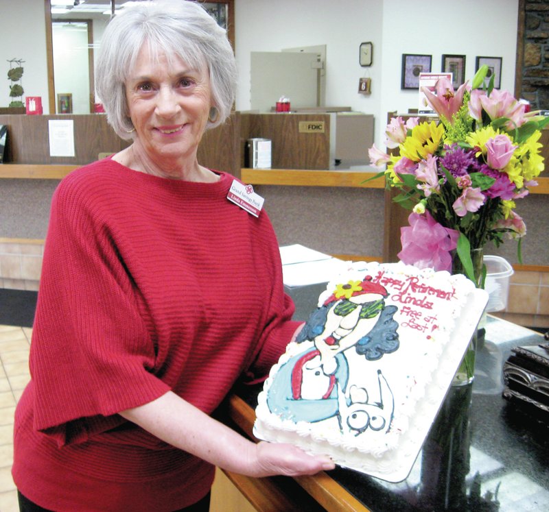 Submitted Photo Linda Emmerson retired from Grand Savings Bank this past Friday. She was with Decatur State Bank, now Grand Savings Bank, for 11 years as a teller and in the bookkeeping department. The Decatur branch celebrated her retirement with cake, a commemorative gift and a potluck lunch.