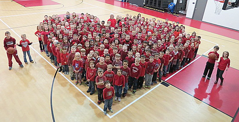 Photograph courtesy of John McGee Pea Ridge elementary school students with Andrea Ricketts, physical education teacher, raise money for the American Heart Association.