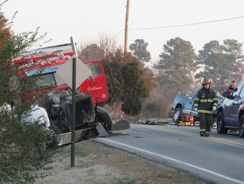 One killed in collision between pickup, truck in Bryant