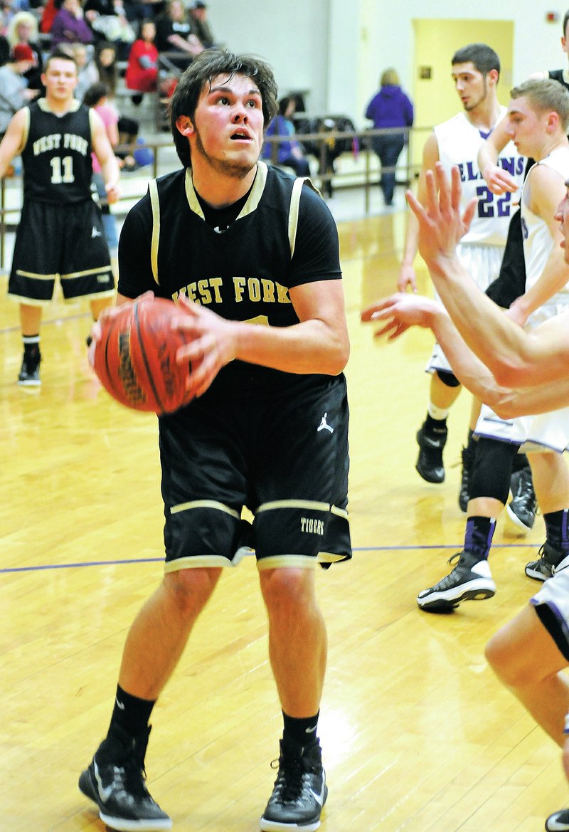 NWA Democrat-Gazette/ J.T. WAMPLER Cody Roebke of West Fork handles the ball Feb. 3 against Elkins.