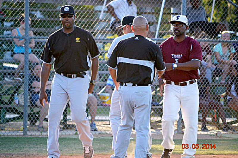 UAPB baseball coach Carlos James (left). 
