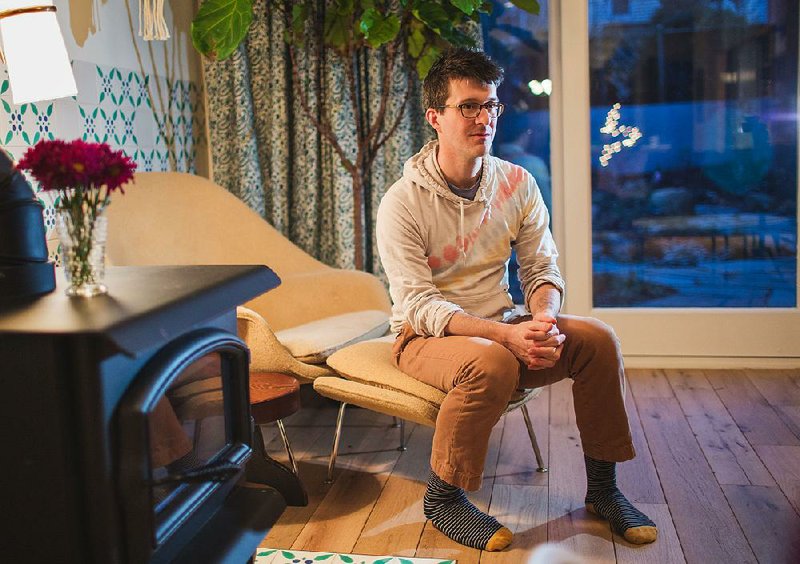Christian Rudder, founder of OKCupid, inside his Williamsburg, Brooklyn, apartment.