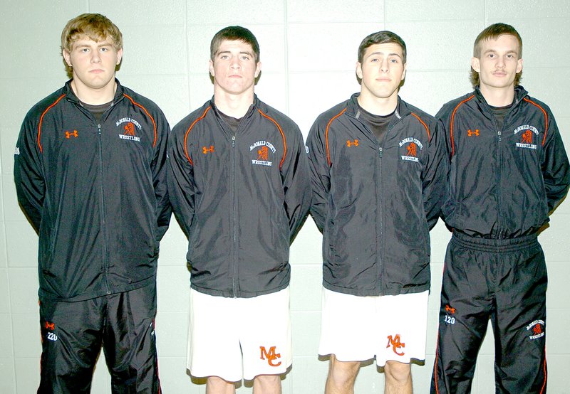 RICK PECK MCDONALD COUNTY PRESS McDonald County High School honored the senior members of the 2014-2015 wrestling team prior to a dual against Grove on Feb. 3. From left to right: Andrew Coberley, Josh Kinser, Christopher Dalton and Landin Foreman.