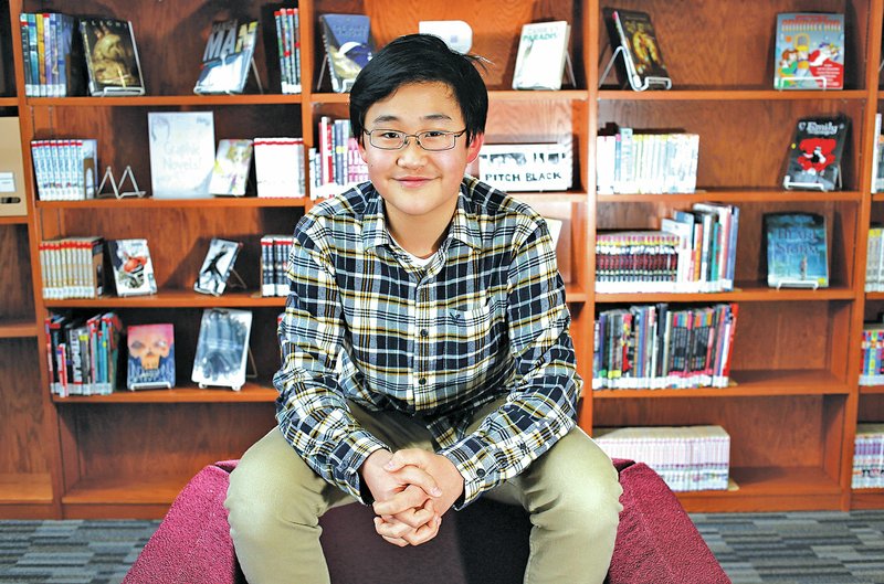 NWA Democrat-Gazette/DAVID GOTTSCHALK Ryan Kim, a sophomore at Fayetteville High School, earned the top score on the ACT. Kim is the fifth student from Fayetteville High School in five years to receive a 36 on the exam.